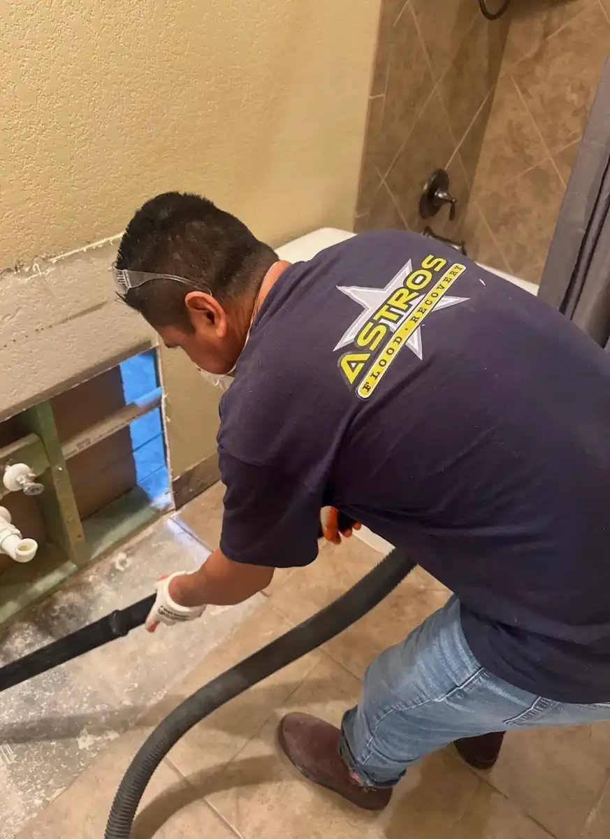 Water damaged bathroom restoration by Astros Flood Recovery