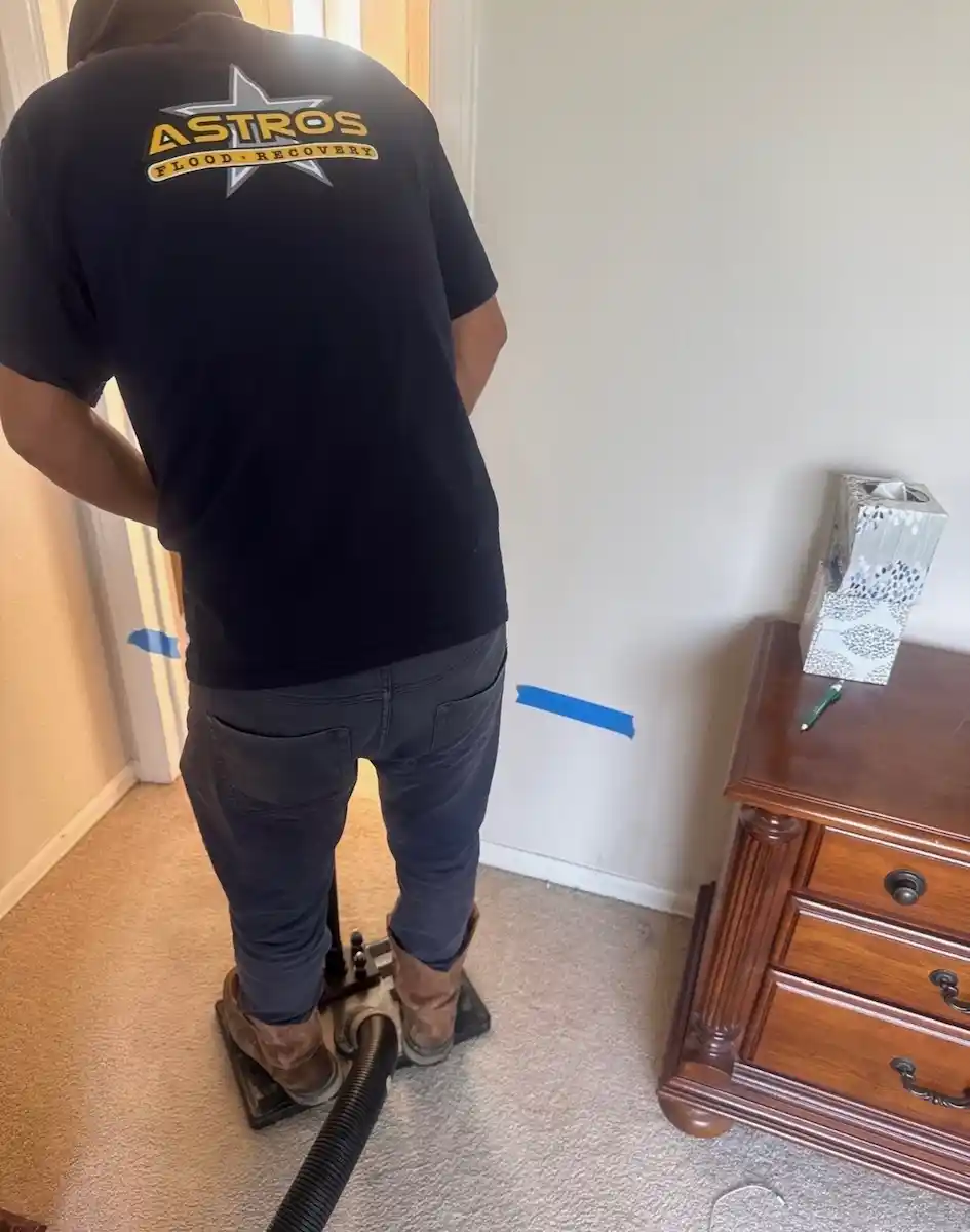 Wet carpet water damage restoration by Astros Flood Recovery