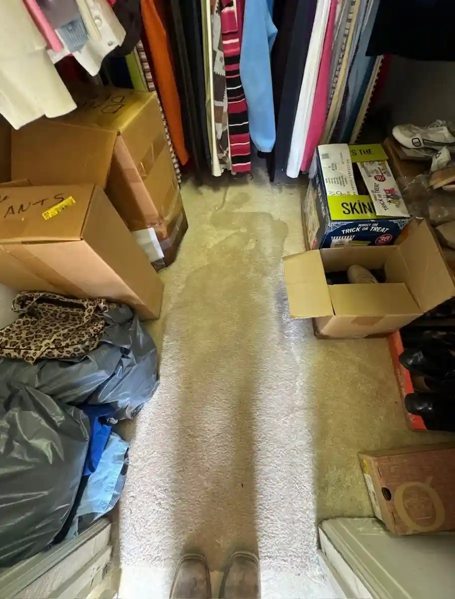 Flooded closet water damage cleanup by Astros Flood Recovery